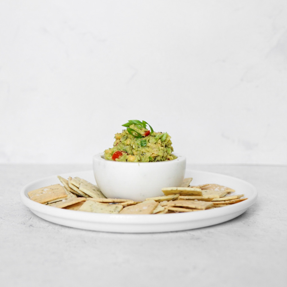 Low FODMAP Chickpea Avocado Salad served as a dip with crackers.