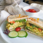 Low FODMAP Curried Chicken Salad between sandwich bread.