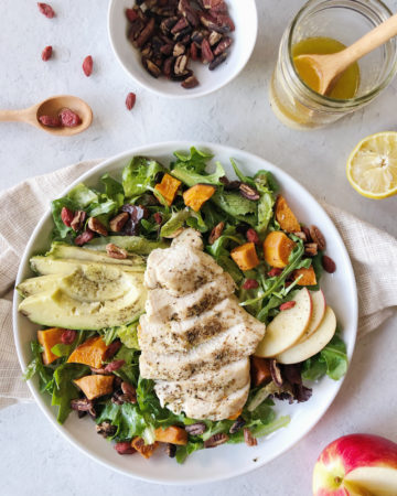 A refreshing, seasonal salad with chicken breast, roasted sweet potato, avocado, pecans and goji berries in a light vinaigrette.