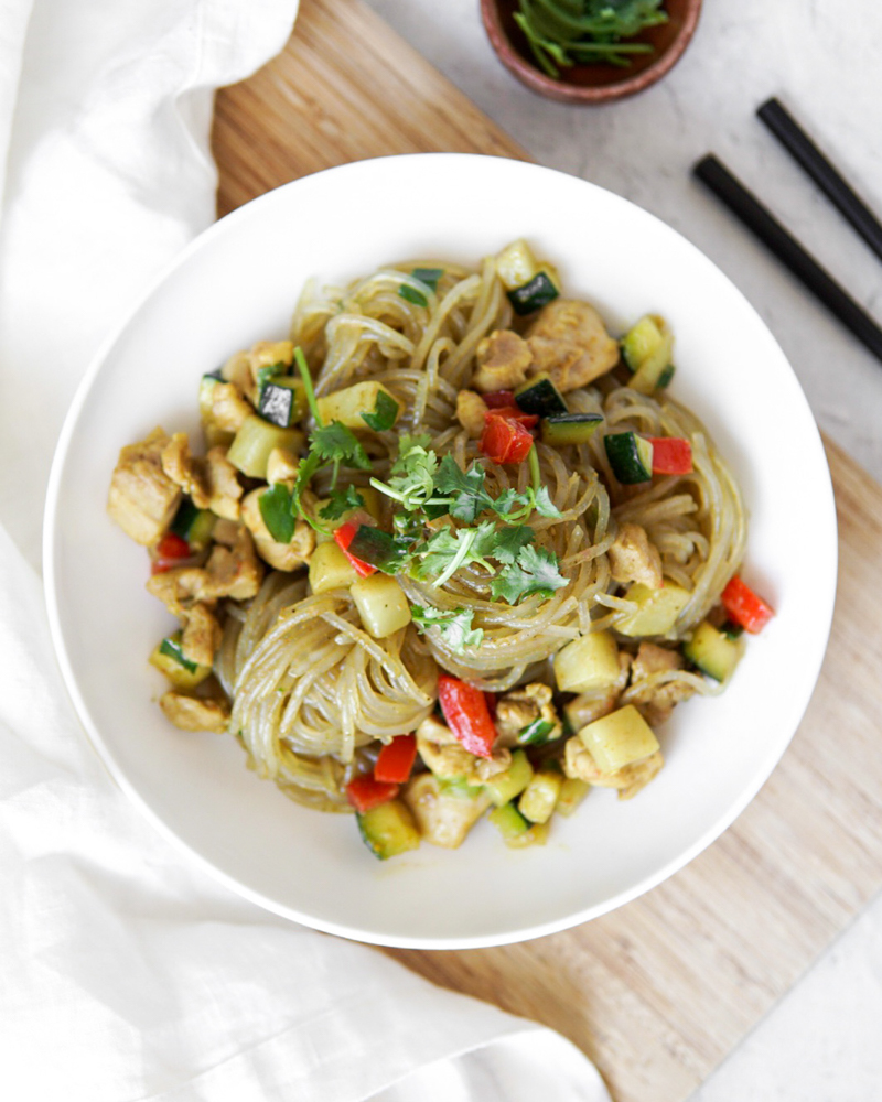 Deliciously saucy chicken curry noodles with potato, red bell pepper and zucchini.