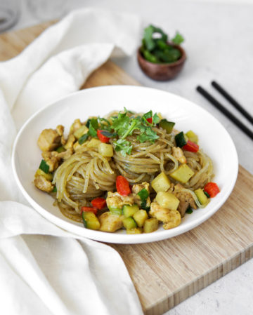 Deliciously saucy chicken curry noodles with potato, red bell pepper and zucchini.