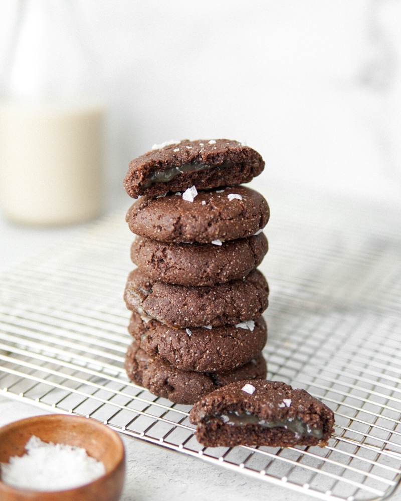 A stack of salted caramel-filled chocolate cookies.