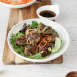 Low FODMAP grilled Vietnamese-style meatballs, served with a dipping sauce and a side of pickled carrot and daikon.