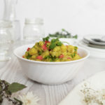 A bowl of Low FODMAP Curried Potato Salad.