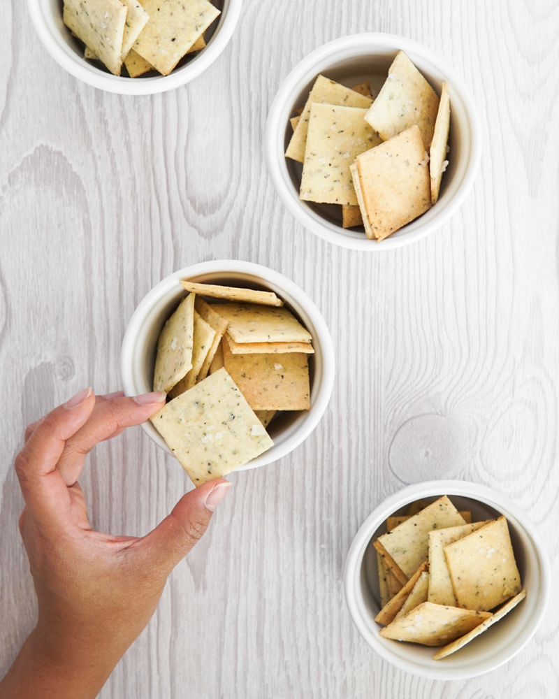 Gluten free & Low FODMAP Tuscan almond flour crackers in cups.